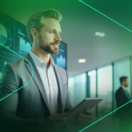 Homem em terno usando tablet em ambiente corporativo