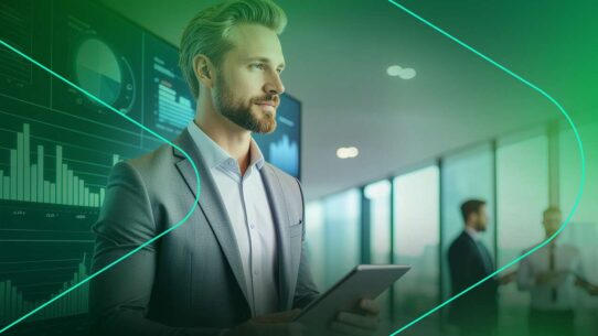 Homem em terno usando tablet em ambiente corporativo