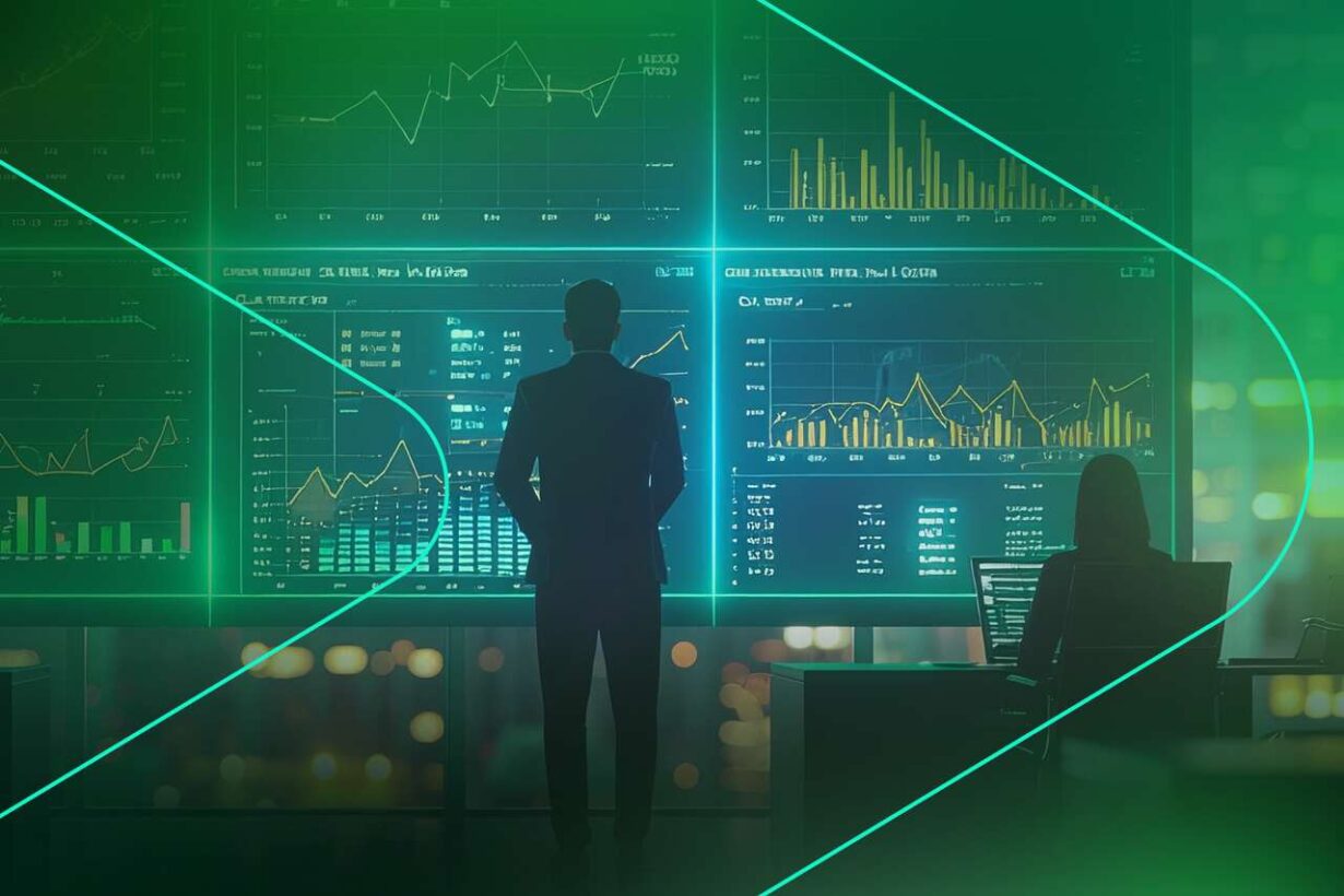 Homem e mulher analisando gráficos financeiros