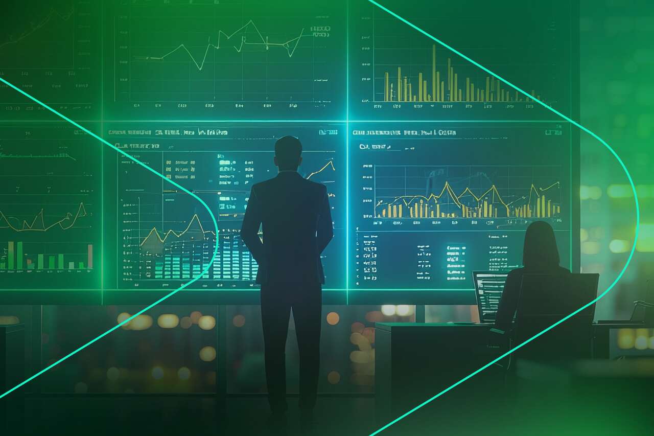 Homem e mulher analisando gráficos financeiros