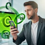 Homem utilizando smartphone com gráficos de segurança digital.
