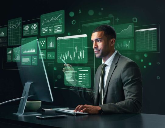 Homem analisando dados em computador moderno.