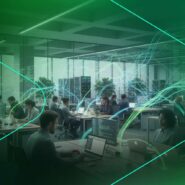 Ambiente de trabalho moderno com pessoas usando tecnologia.